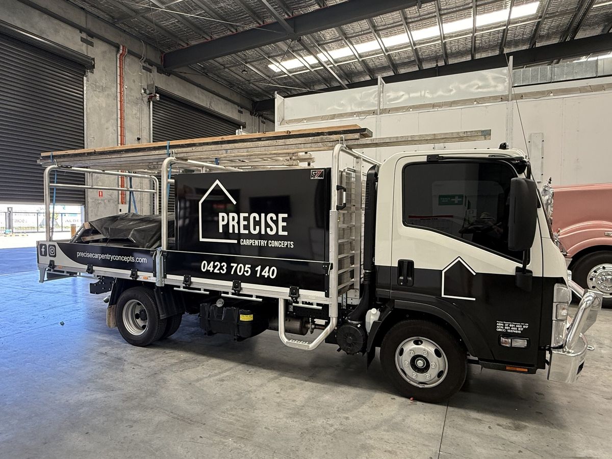 The Precise Carpentry Concepts truck in the yard at Ormeau